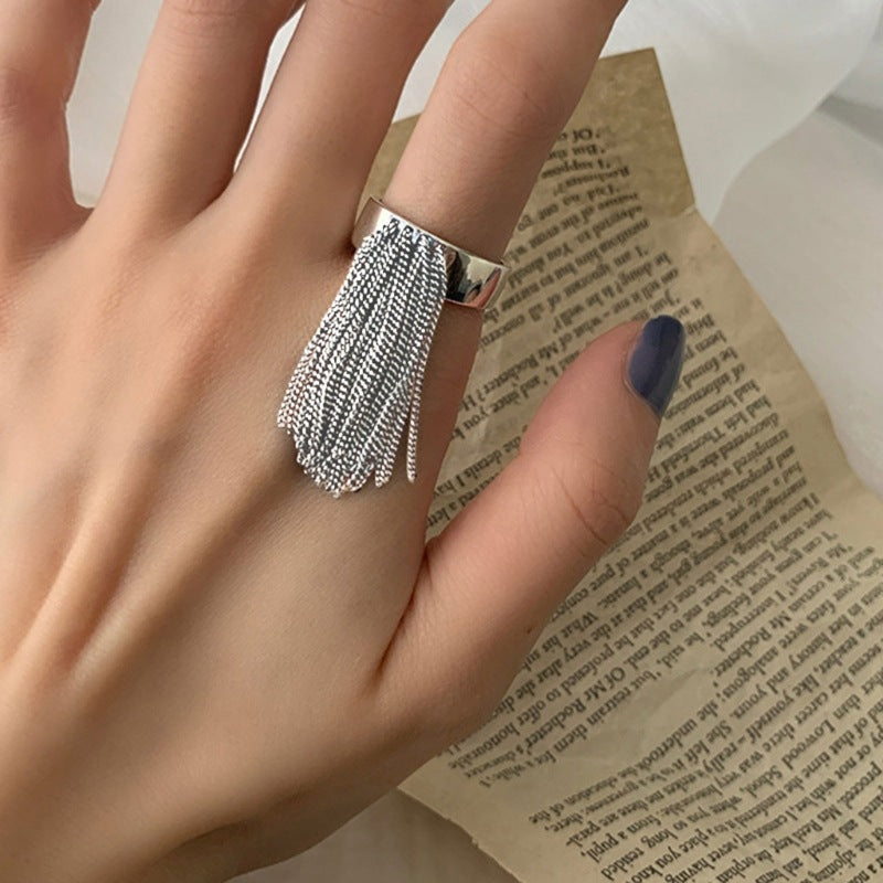 Stylish ring with filigree tassel design Kalsten