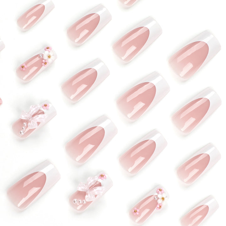 Artificial nail extensions with floral accents Kalsten