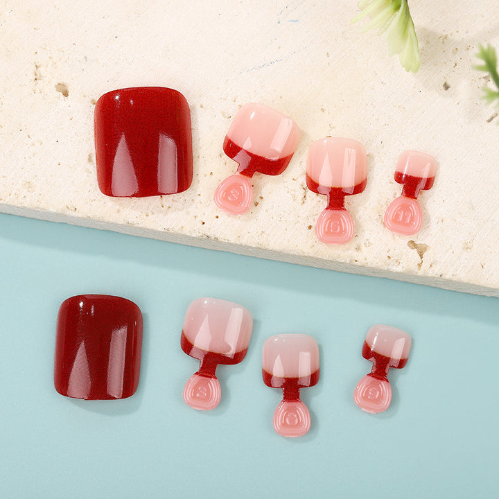 Acrylic nail set in elegant red and nude design Kalsten
