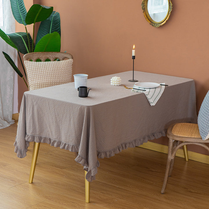 Rectangular tablecloth made of cotton waffle fabric with fine ruffle trim