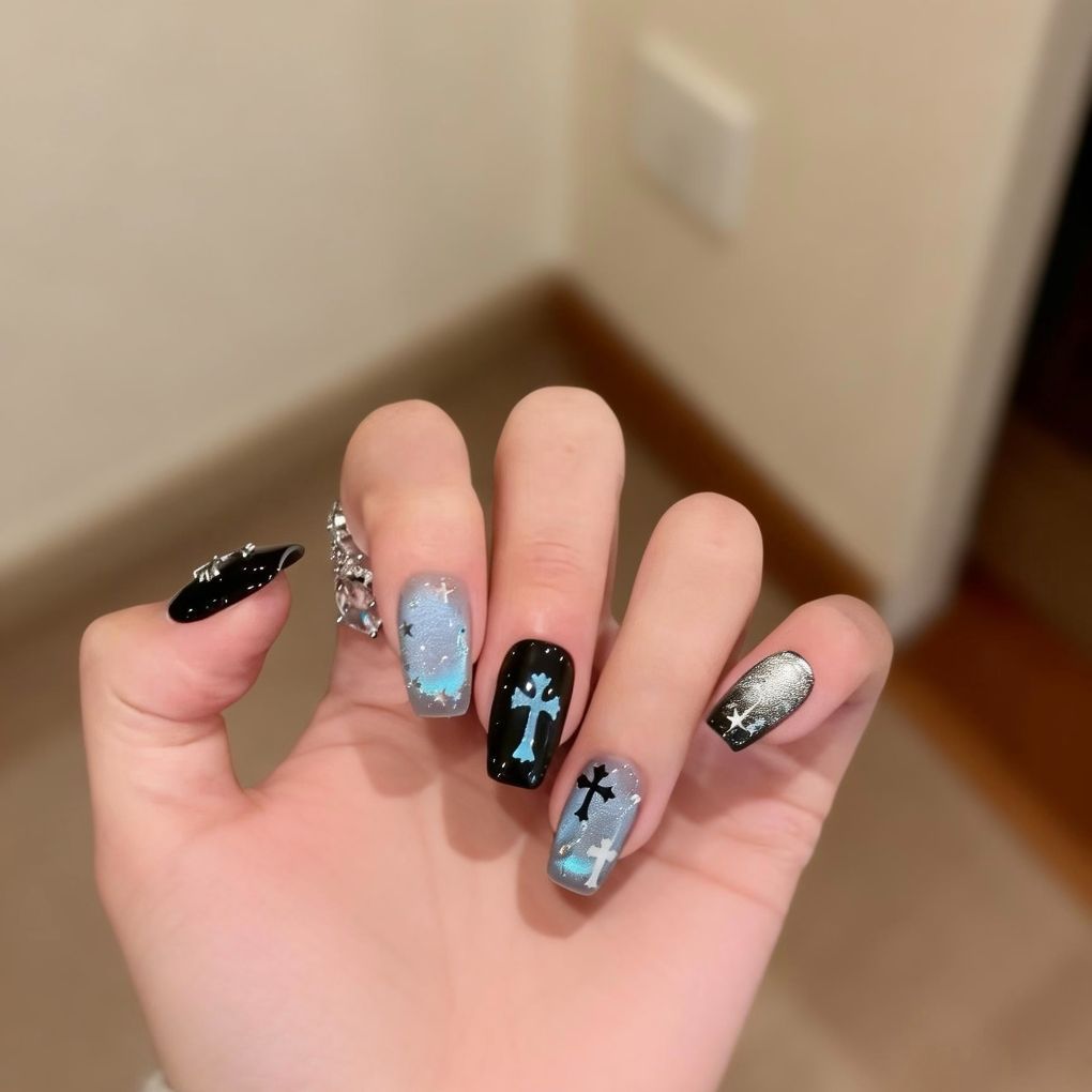 Artistic Press-On Nail Art with Cross and Star Designs