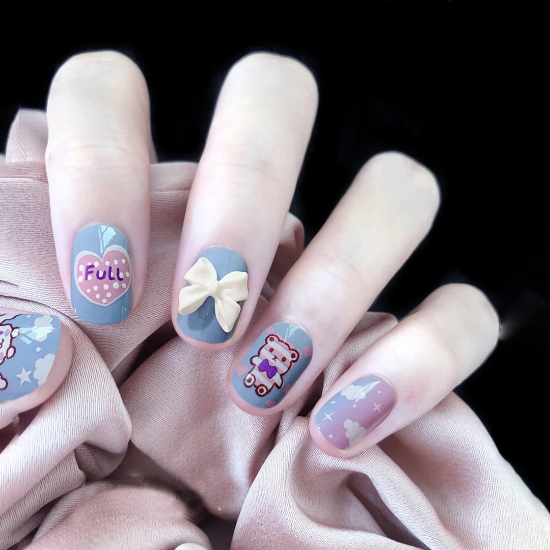 Artful Nail Art with Bow and Heart Design Kalsten
