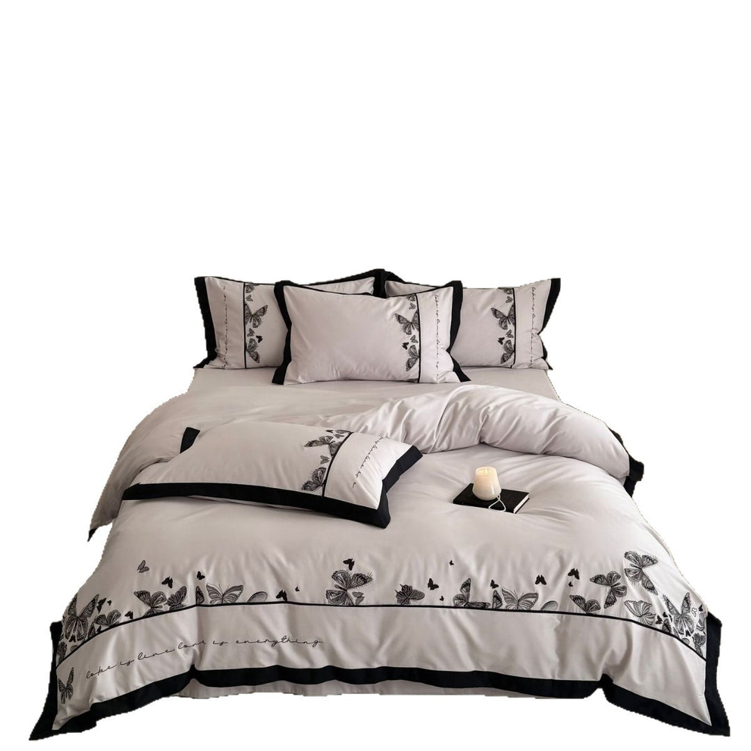 Bedding set with butterfly embroidery and contrast piping