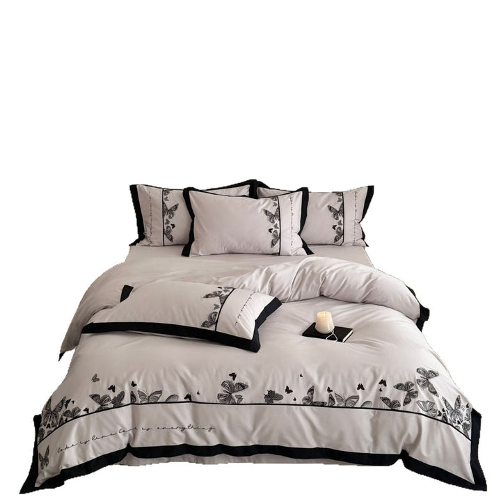 Bedding set with butterfly embroidery and contrast piping