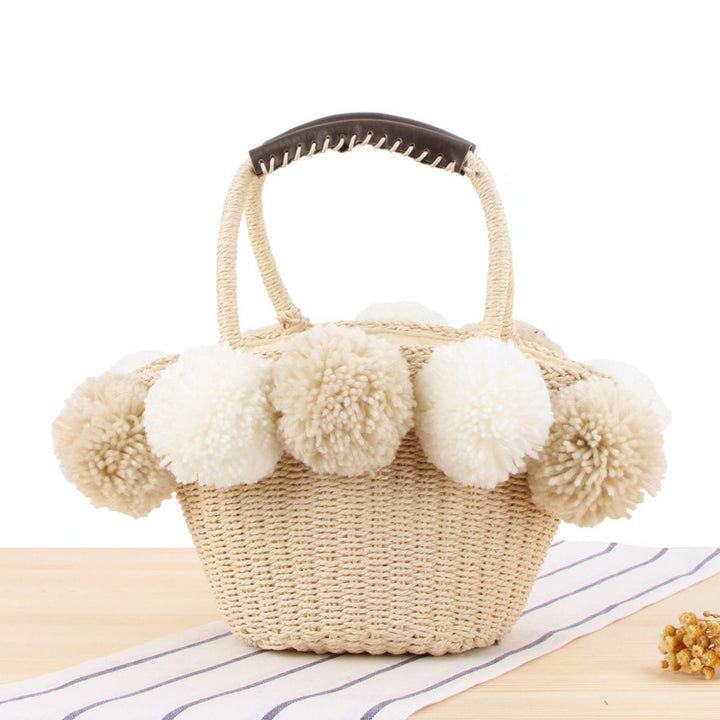 Basket bag with pompom decorated top edge Kalsten