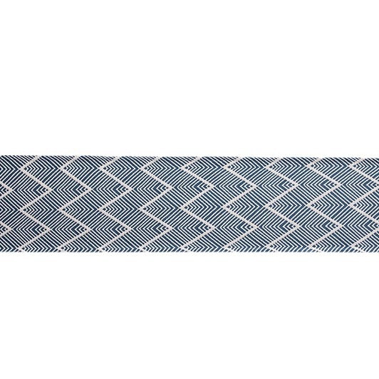 Woven table runner with geometric herringbone diamond pattern and decorative tassels
