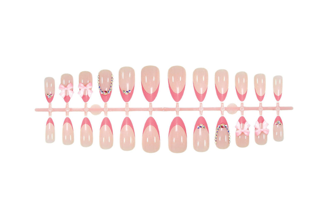 Artificial nail set with playful floral decorations and elegant glitter accents Kalsten