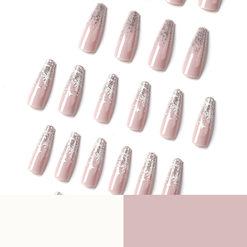Artful nail art in winter design with glitter and snowflakes Kalsten
