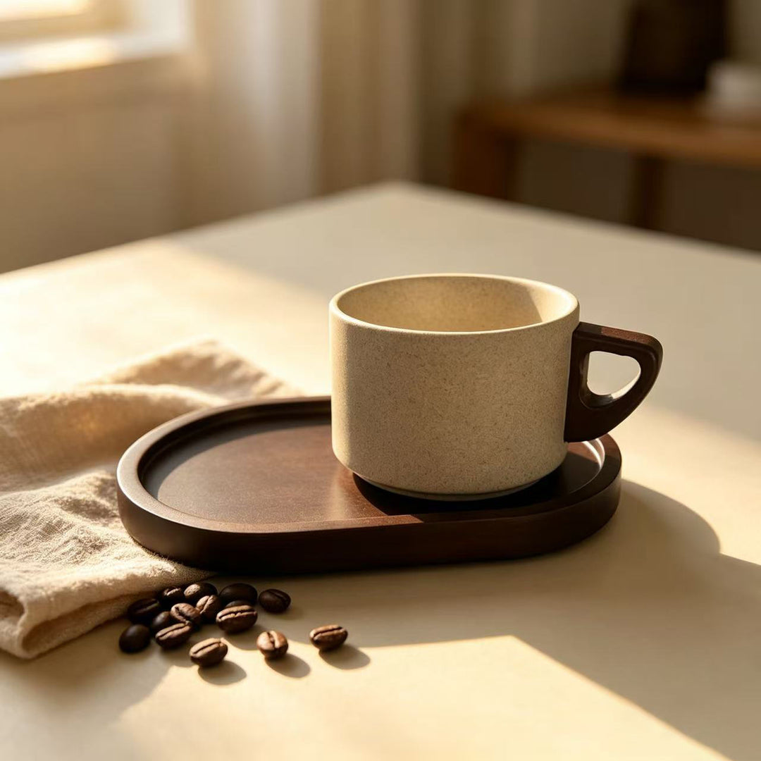 Ceramic mug with ergonomic wooden handle and matching coaster