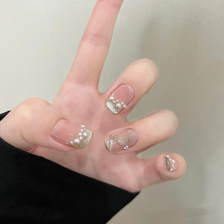 Elegant artificial nails with pearl decorations and glitter effects Kalsten