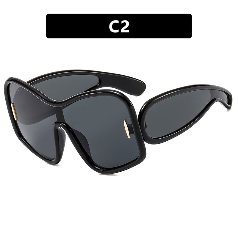 Women’s futuristic sunglasses with extra wide design and protective UV filter Kalsten