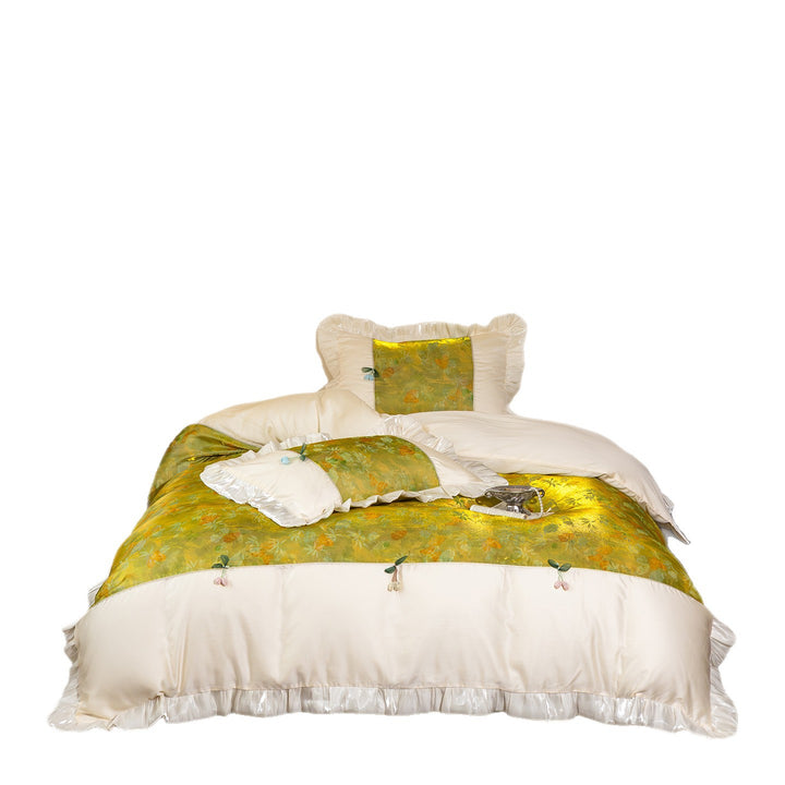 Bedding set with ruffles, satin trim and floral center panel