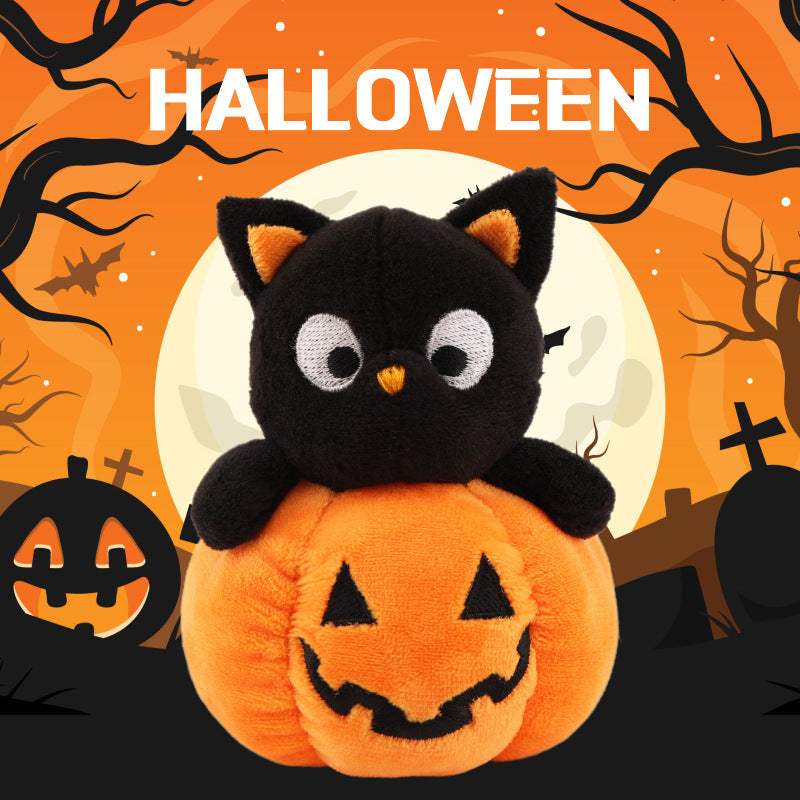 Plush figure cat on pumpkin with embroidered face