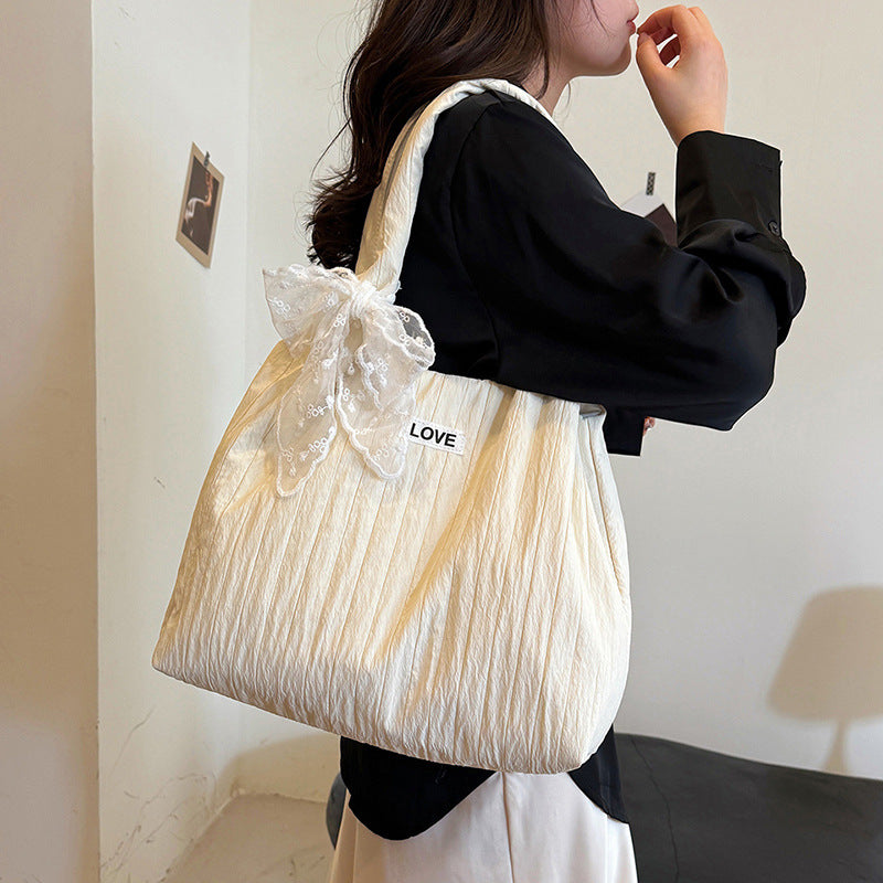 Leisure bag with structured design and playful scarf Kalsten