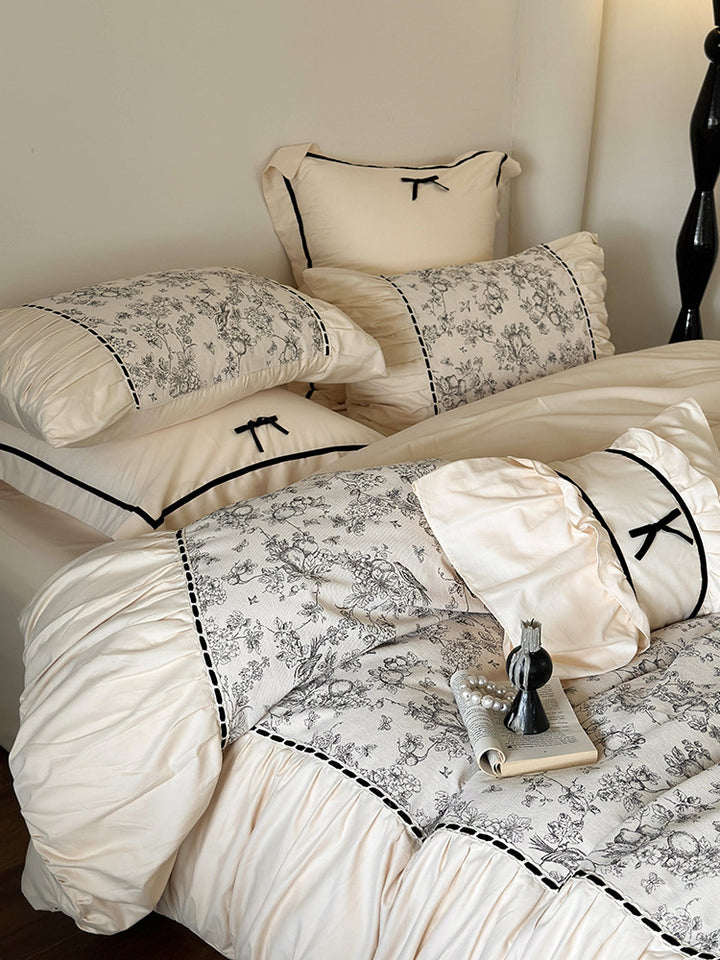 Romantic cotton percale bedding set with fine toile print and ruffle trim