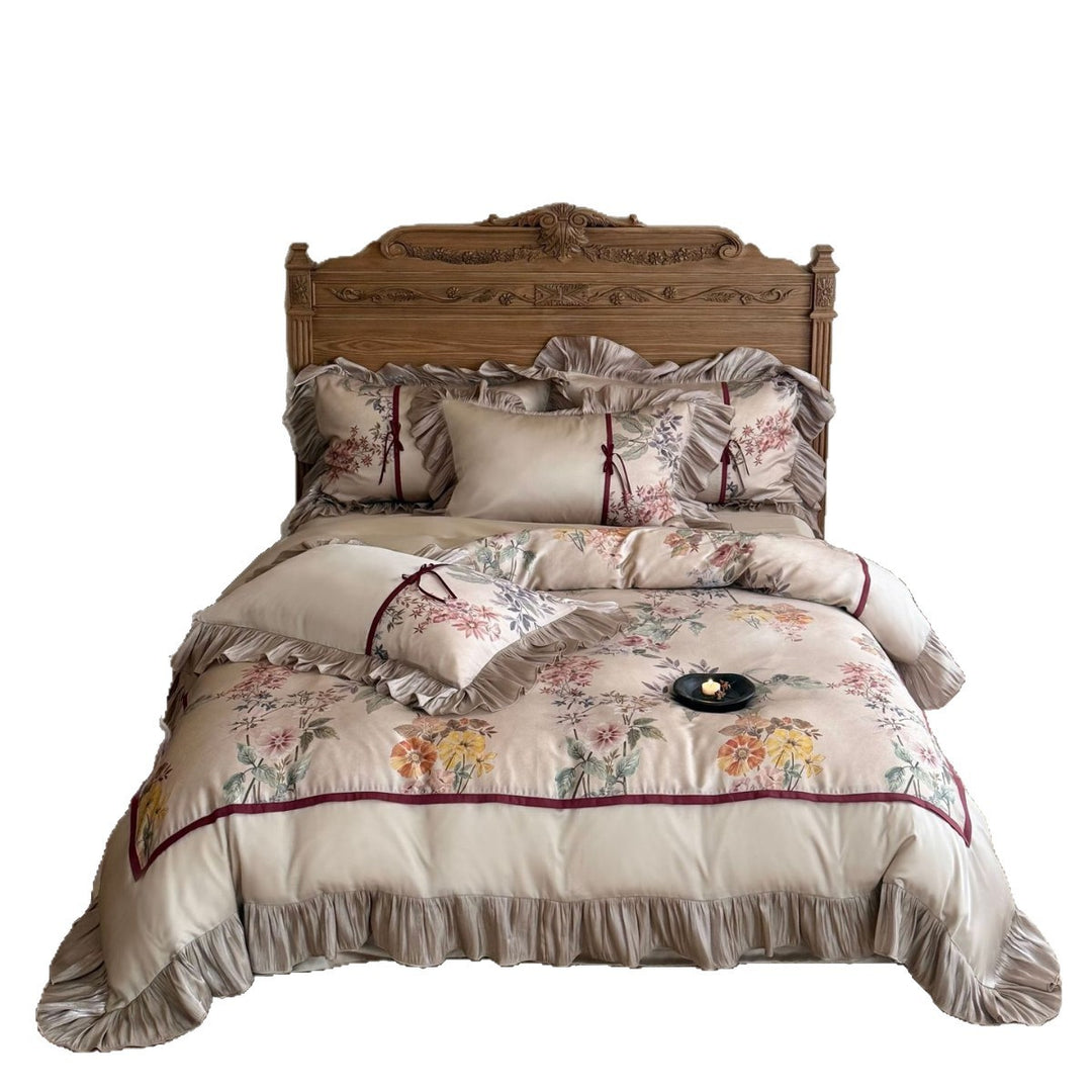 Romantic satin bedding set with ruffles, floral embroidery and reversible function