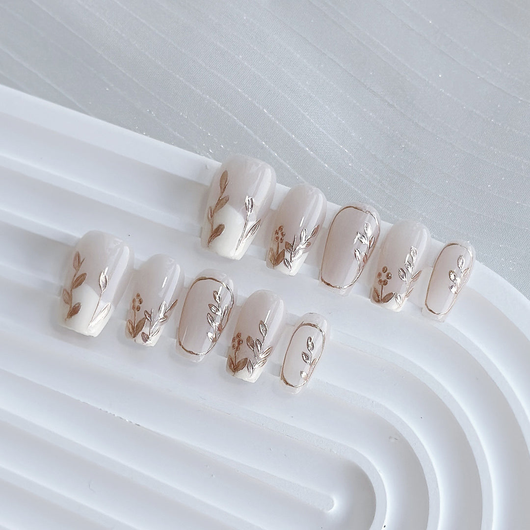 Artistic Press-On Nail Art Set with Heart and Celestial Designs