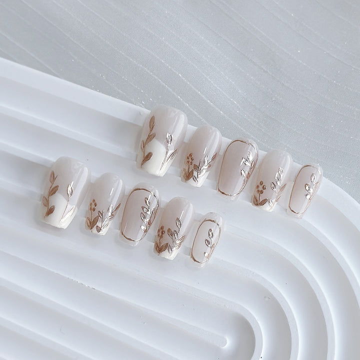 Artistic Press-On Nail Art Set with Heart and Celestial Designs