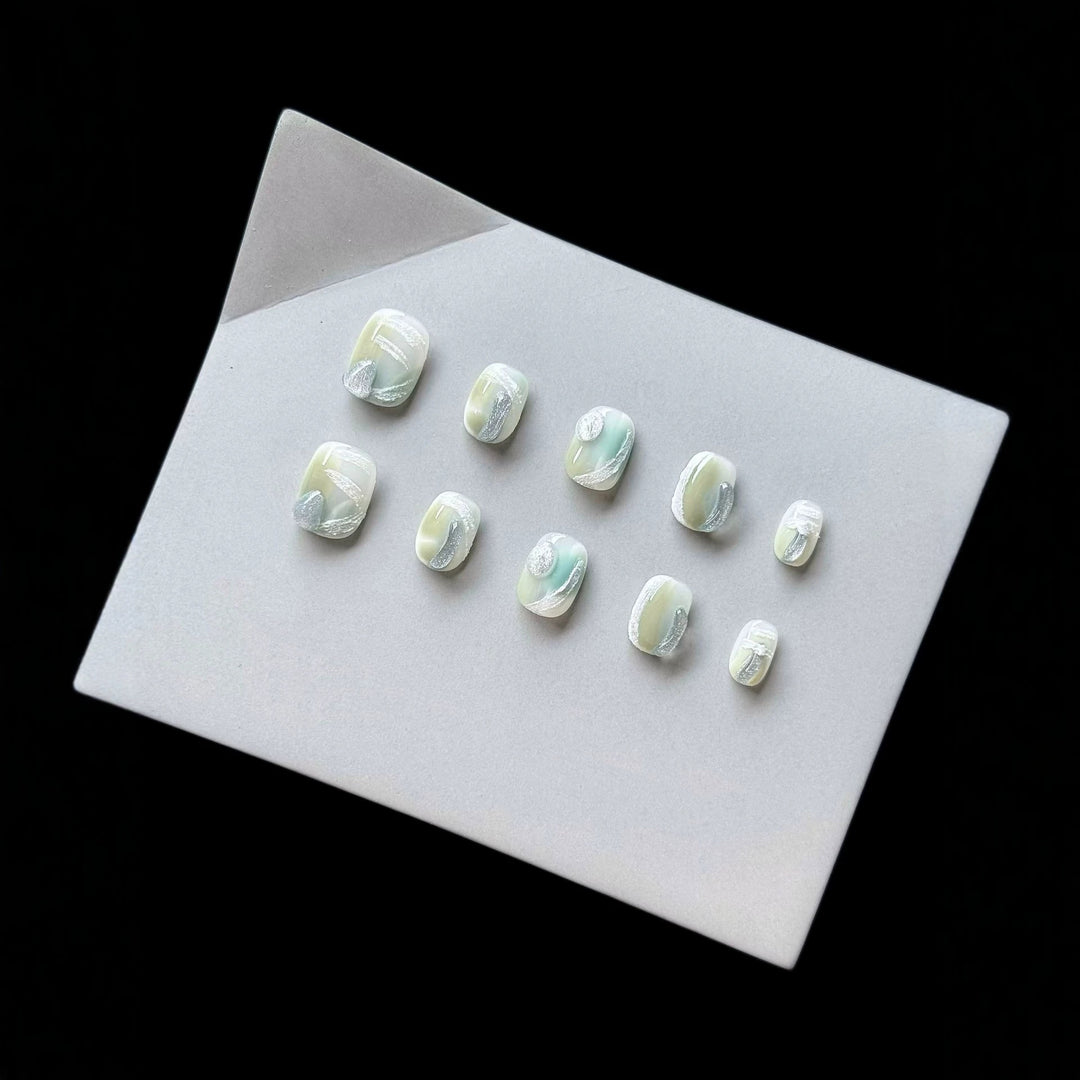 Artistic Press-On Nail Set with Glossy Marble Design
