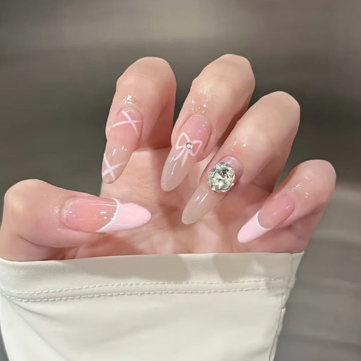 Decorative Press-On Nail Extensions with Bow and Rhinestone Accents Kalsten