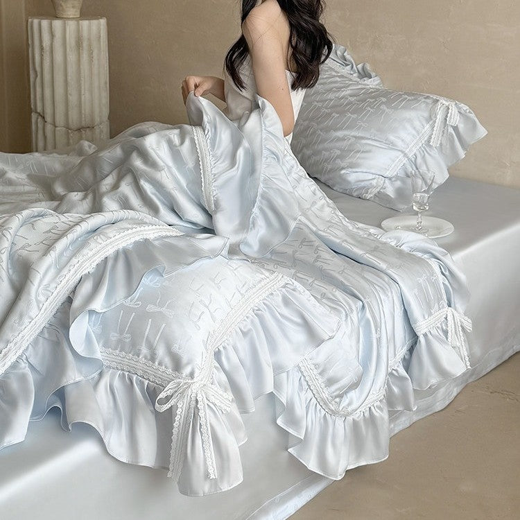 Satin bedding set with jacquard bow relief, gathered ruffle and lace trim