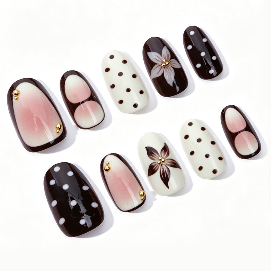 Acrylic nail set with floral accents and elegant design Kalsten