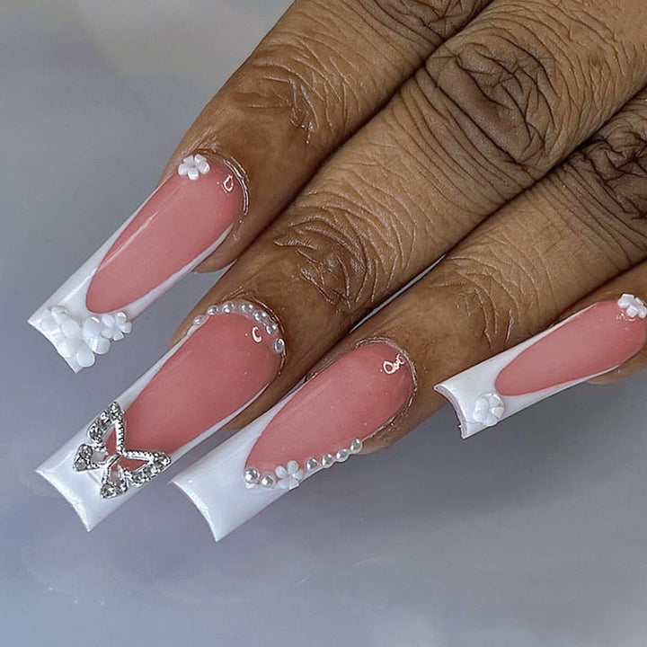 Artificial nail set with elegant floral decorations and glitter accents Kalsten