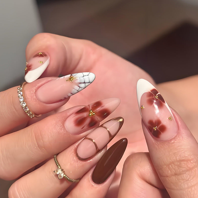 Artificial nail set with elegant floral and glamorous design elements Kalsten