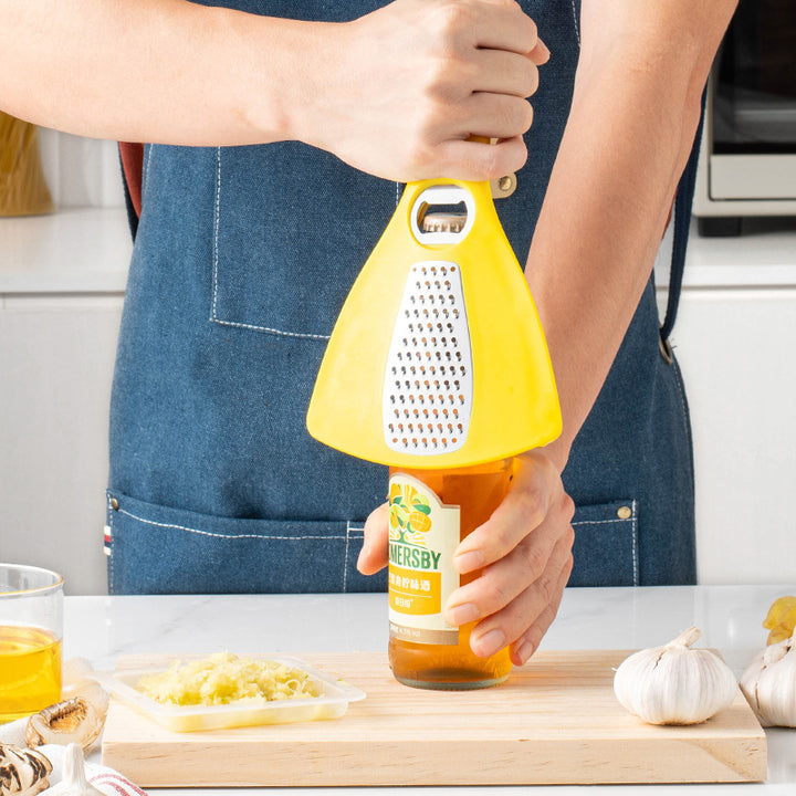 Multifunctional kitchen grater with integrated bottle opener function Kalsten