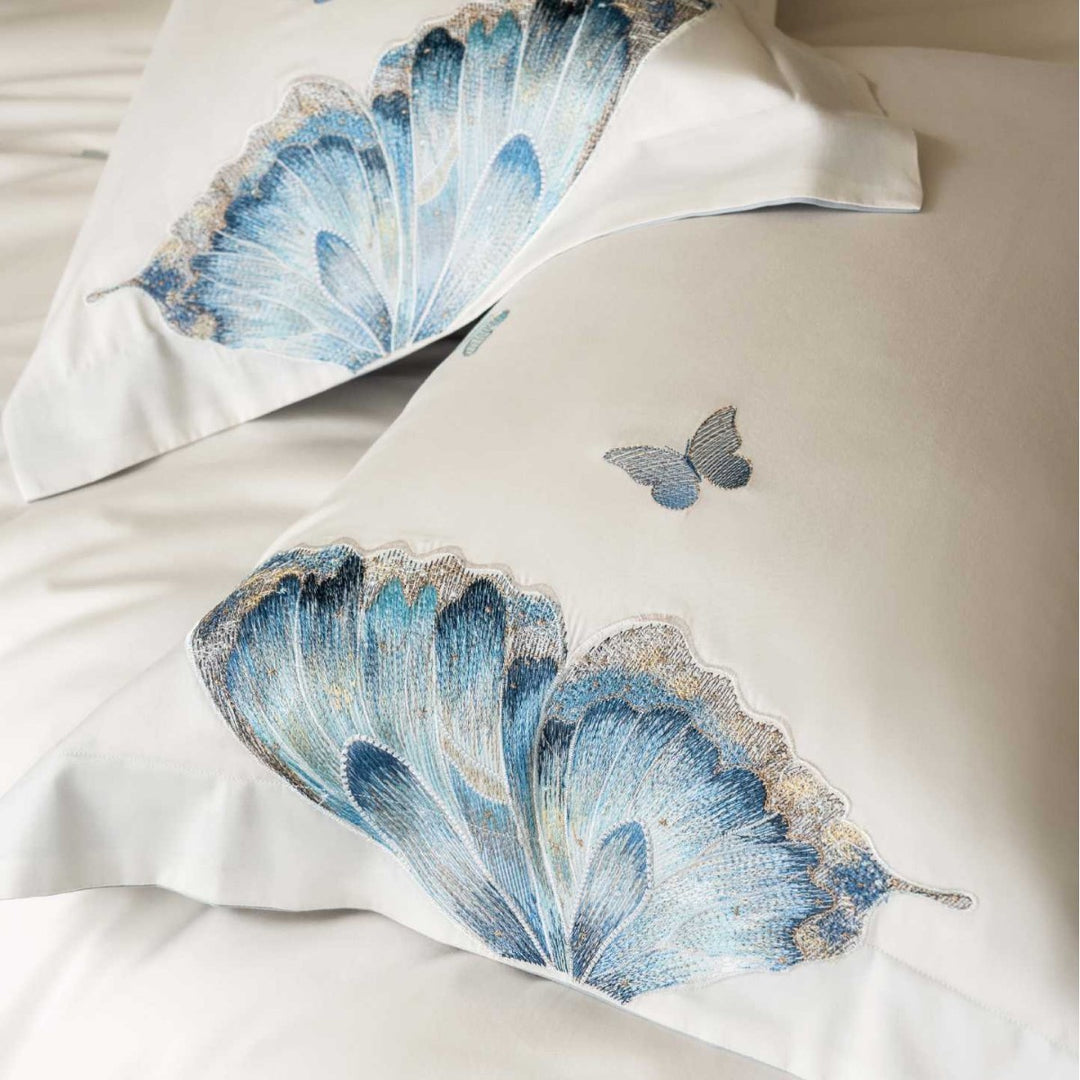 Embroidered cotton satin bedding set with blue butterfly motif