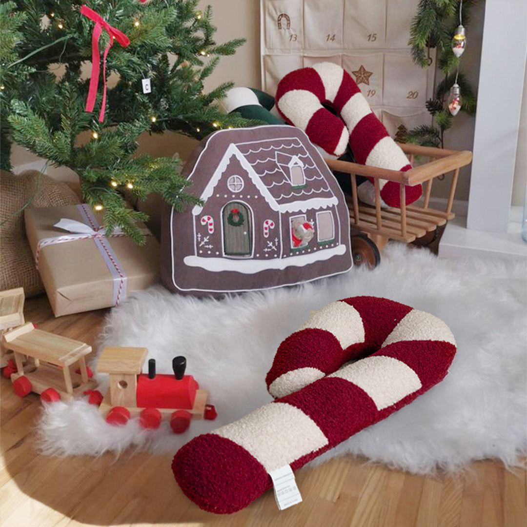 Travel pillow in candy cane design with ergonomic neck support