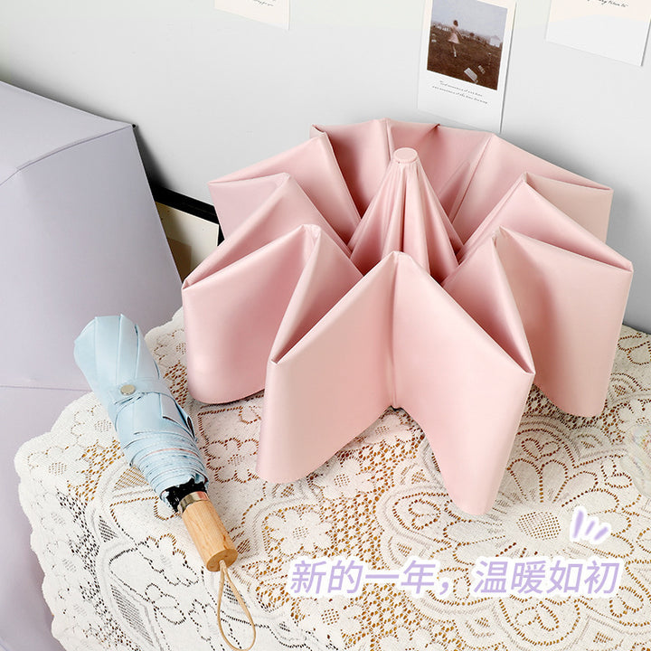 Ladies elegant folding umbrella in portrait format with stylish wooden handle Kalsten