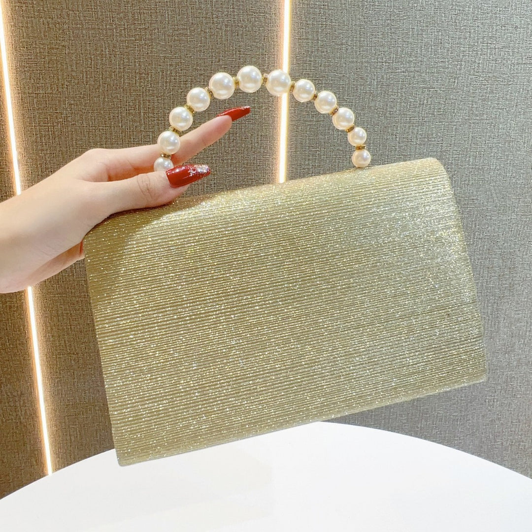 Elegant Pearl-Handled Evening Clutch