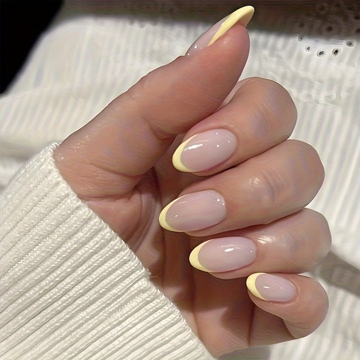 Artificial nail set with elegant French tips and creative accents Kalsten