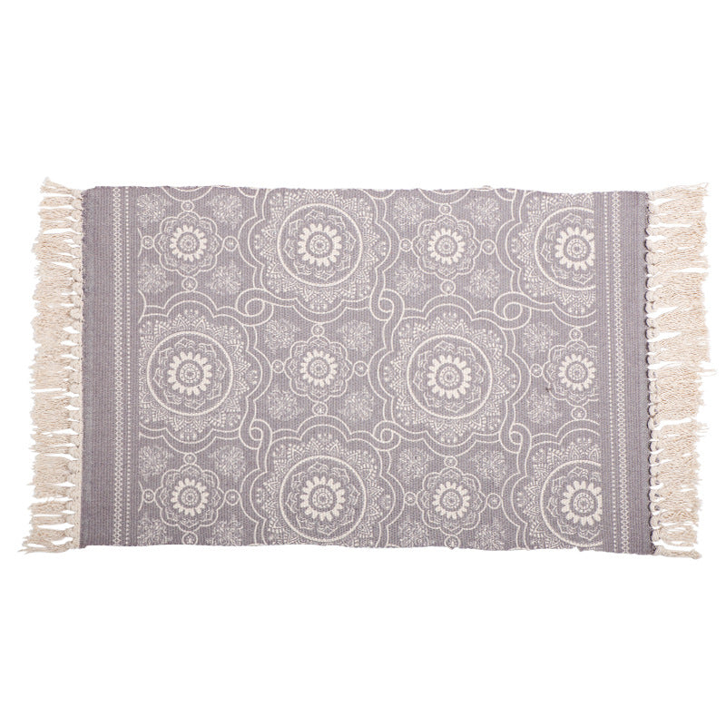 Handwoven cotton table runner with mandala jacquard and decorative fringes