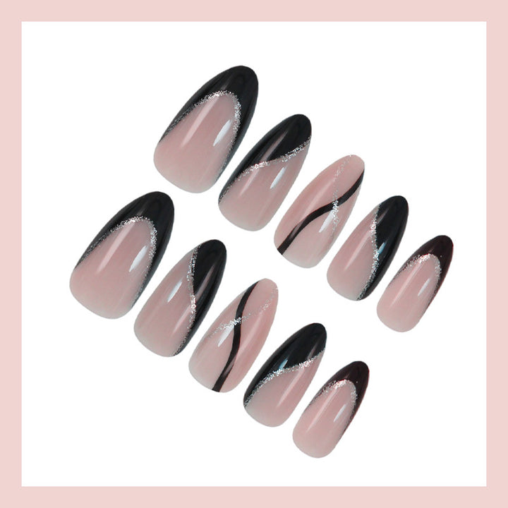 Artificial nail set with elegant black and white design and glitter accents Kalsten