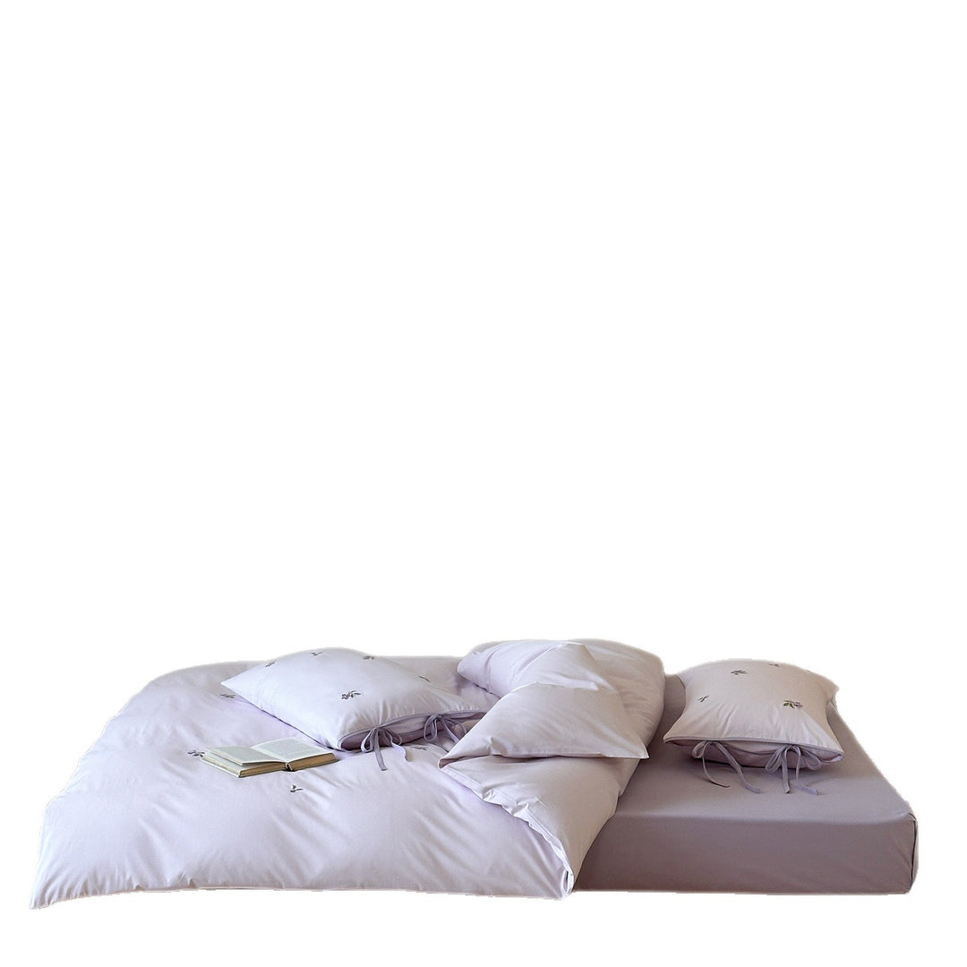 Reversible cotton bedding set with fine check pattern, cherry embroidery, and decorative tie ribbons