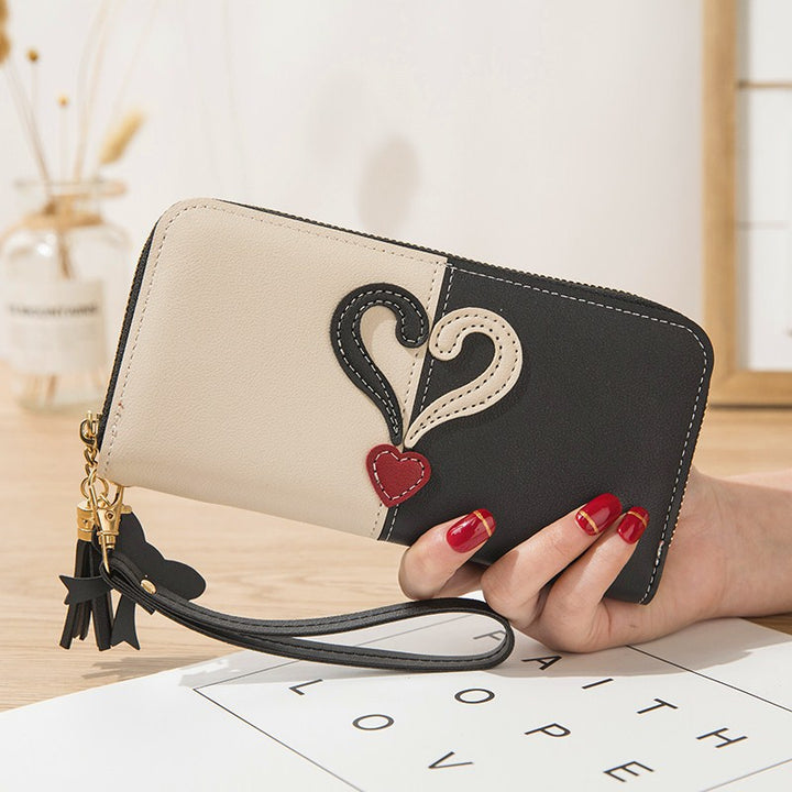 Stylish wallet with heart appliqués Kalsten
