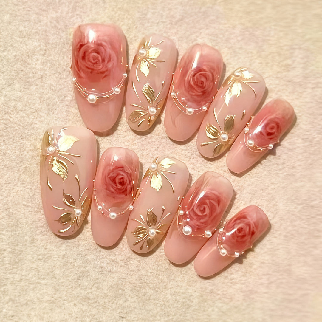 Artificial nail set with elegant rose and gold embellishments Kalsten