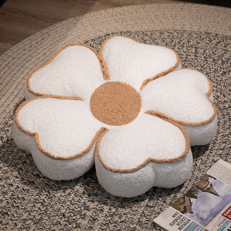 Padded seat cushion in flower shape with faux leather center piece and fluffy edge padding