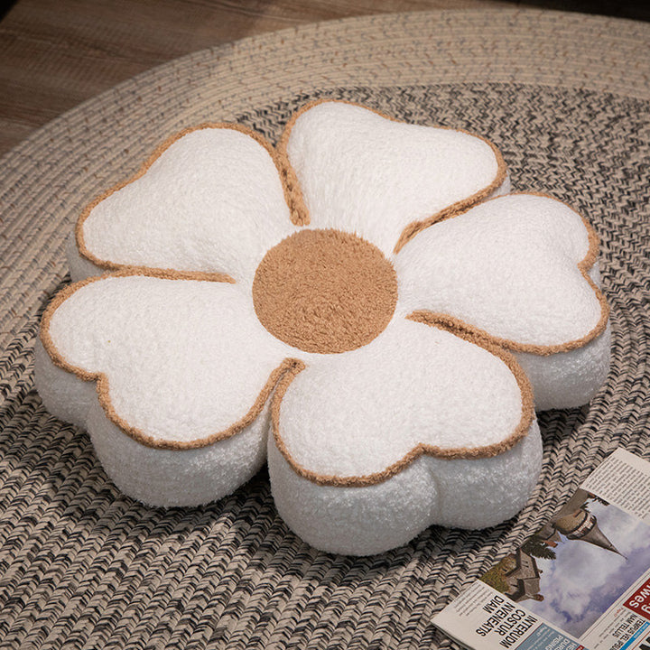 Padded seat cushion in flower shape with faux leather center piece and fluffy edge padding