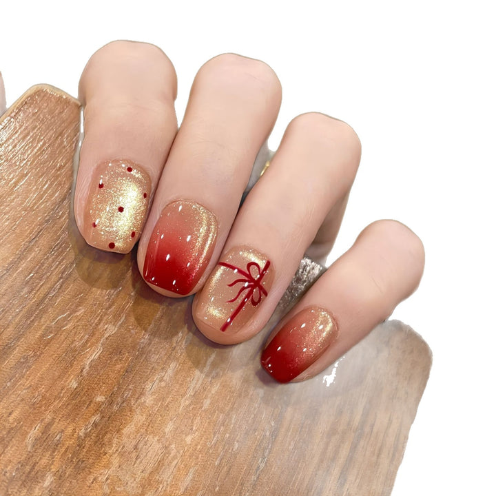 Artificial nails with festive gradient color and elegant decorations Kalsten