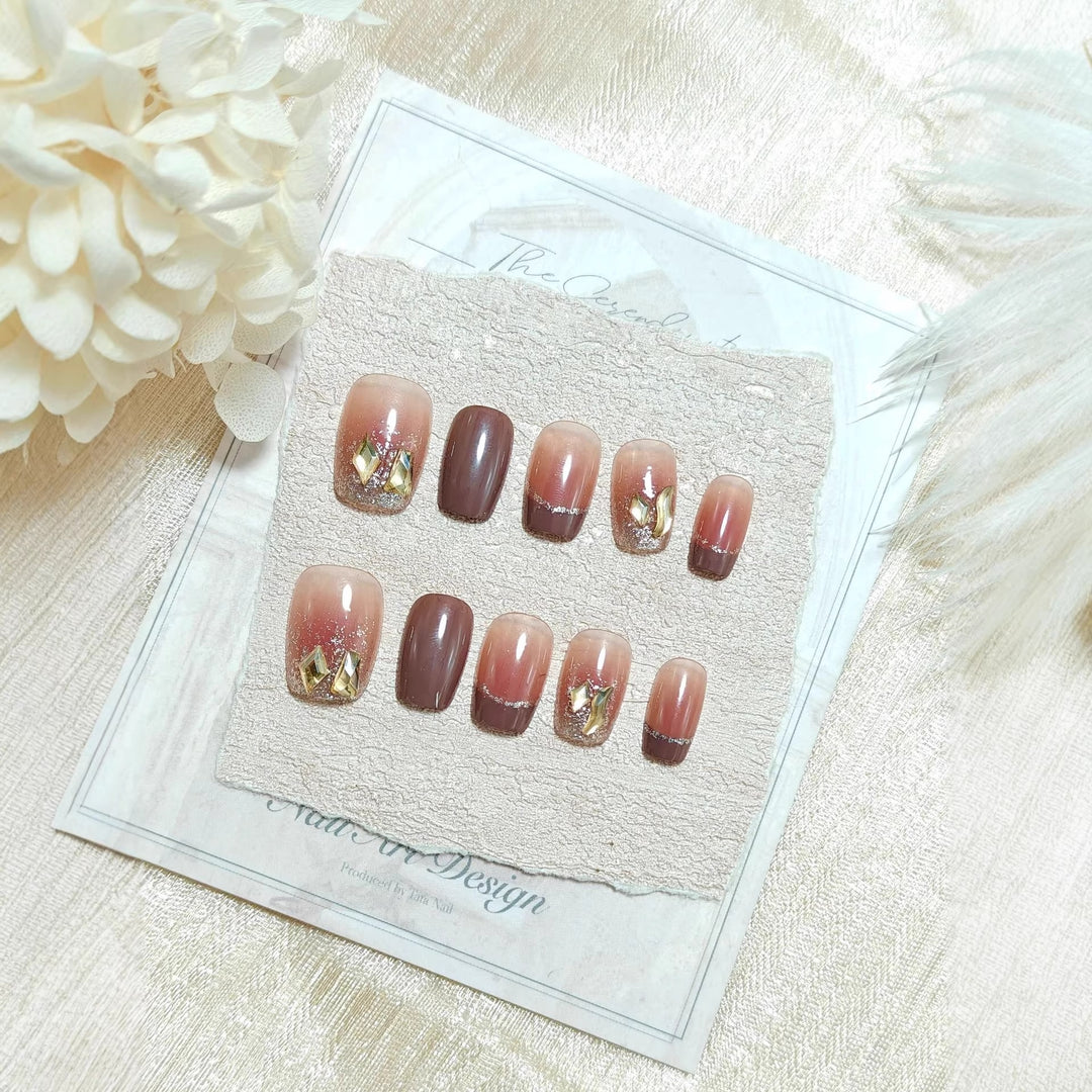 Acrylic nails in elegant ombre design with glitter elements Kalsten