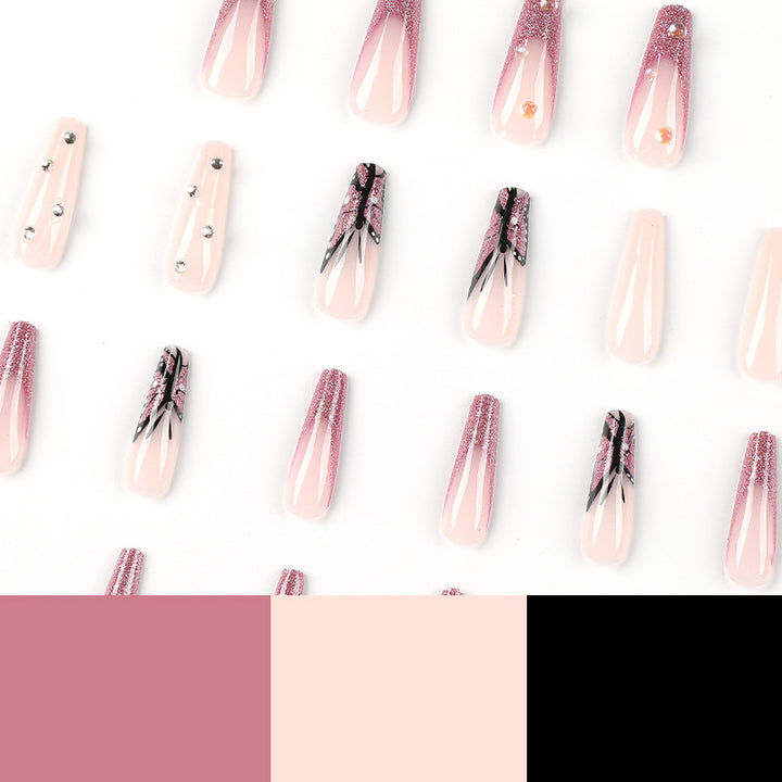 Artful stiletto nails with floral and glittering accents Kalsten