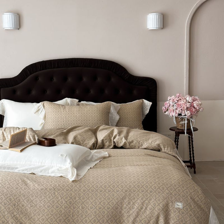 Luxurious cotton satin bed linen set in vintage style with delicate floral pattern and lace trim