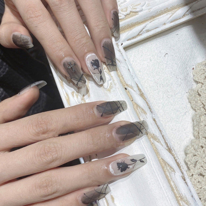 Artful stiletto nails with floral accents Kalsten
