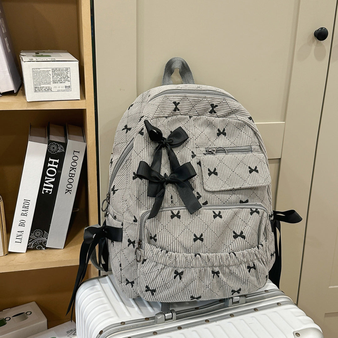 Playful backpack with bow details and practical compartments Kalsten