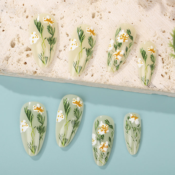 Handmade art nails with floral accents Kalsten