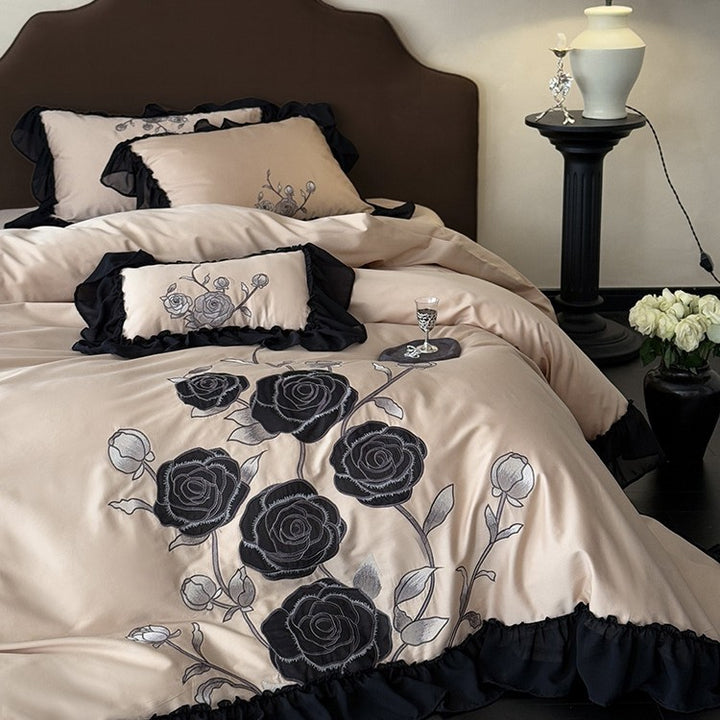 Luxurious bedding set with rose embroidery and ruffled hem