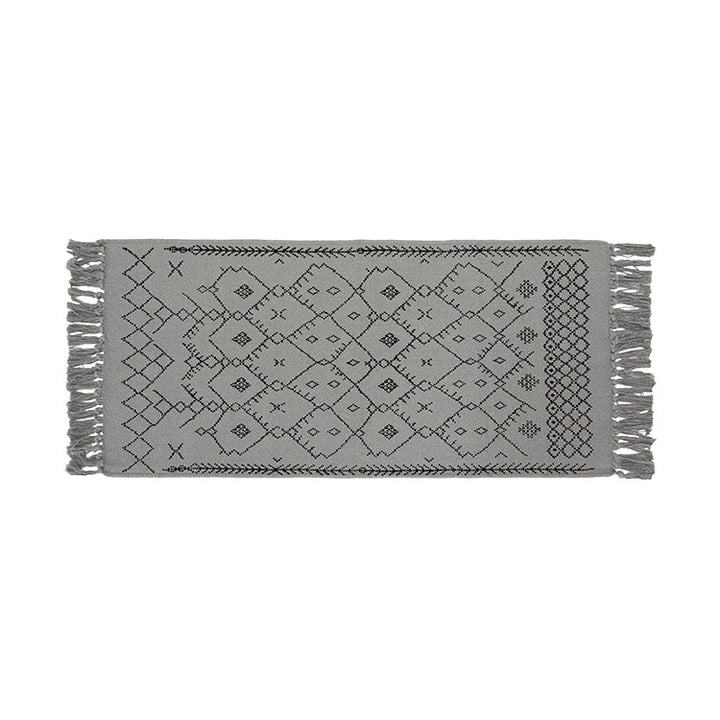Woven cotton rug runner with flat weave structure, graphic diamond ethnic pattern and fringes